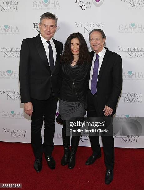 Dr. Alex Gershman, Wendy Rogers and Barry Axelrod attend the Victorino Noval Foundation Christmas Party on December 17, 2016 in Beverly Hills,...