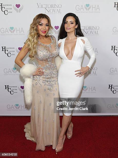 Olga Loera and Penelope Felix Ceja attends the Victorino Noval Foundation Christmas Party on December 17, 2016 in Beverly Hills, California.