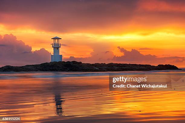 lighthouse at sunset at khao lak - khao lak stock pictures, royalty-free photos & images