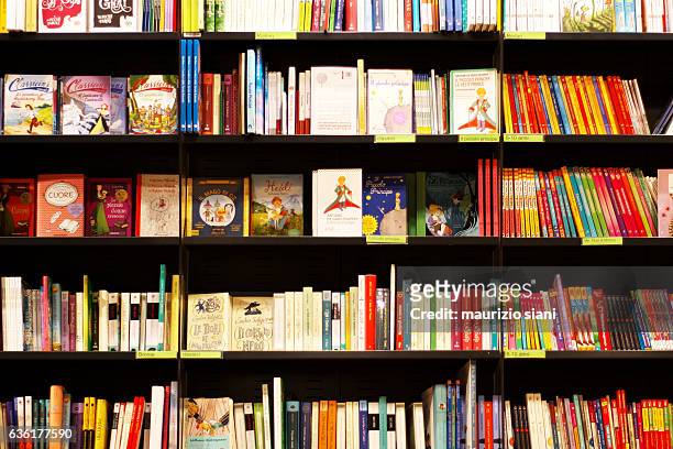 books on shelves in bookstore - bookstore ストックフォトと画像