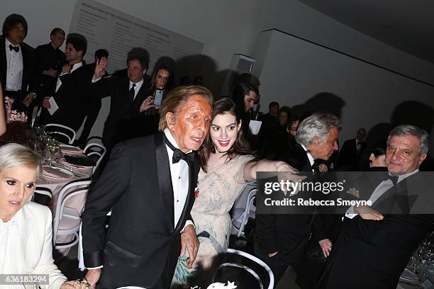 Maria Grazia Chiuri, Valentino Garavani, Anne Hathaway, Giancarlo Giammetti, and Sidney Toledano attend the Guggenheim International Gala at the...