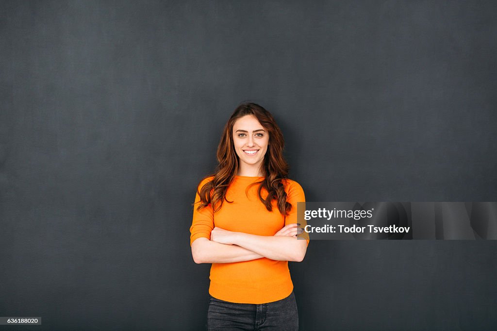 Woman In Front of Blackboard
