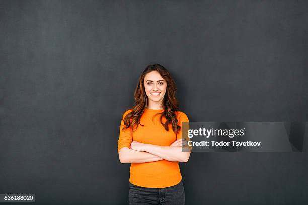 woman in front of blackboard - portrait of teacher and student bildbanksfoton och bilder