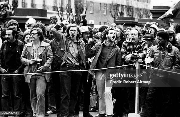 Group of people yell during an Anti-War Rally demonstration at the Fairmont Hotel circa 1973 in San Francisco, California.