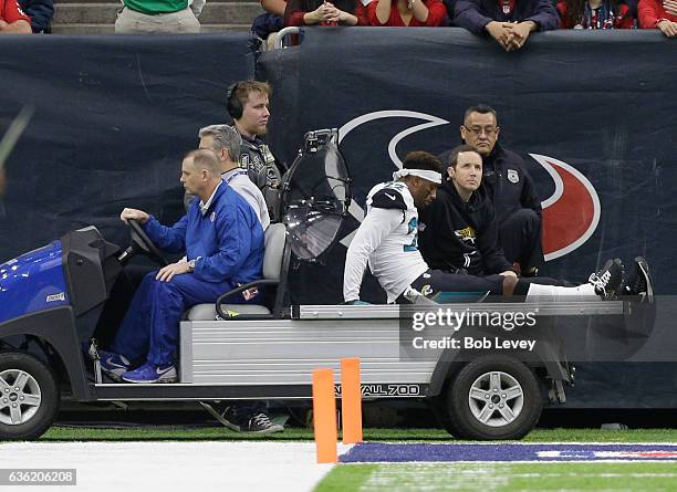 Aaron Colvin of the Jacksonville Jaguars is carted off the field against the Houston Texans at NRG Stadium on December 18, 2016 in Houston, Texas.