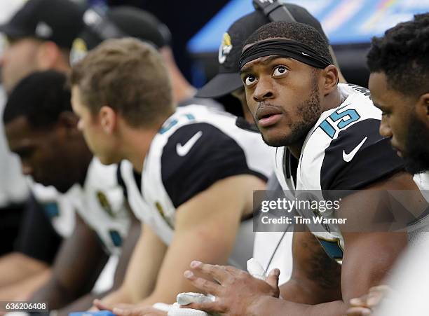 Allen Robinson of the Jacksonville Jaguars watches a replay from the bench during the game against the Houston Texans at NRG Stadium on December 18,...