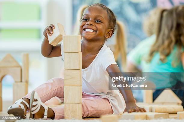 1,404 Child Stacking Blocks Stock Photos, High-Res Pictures, and Images ...