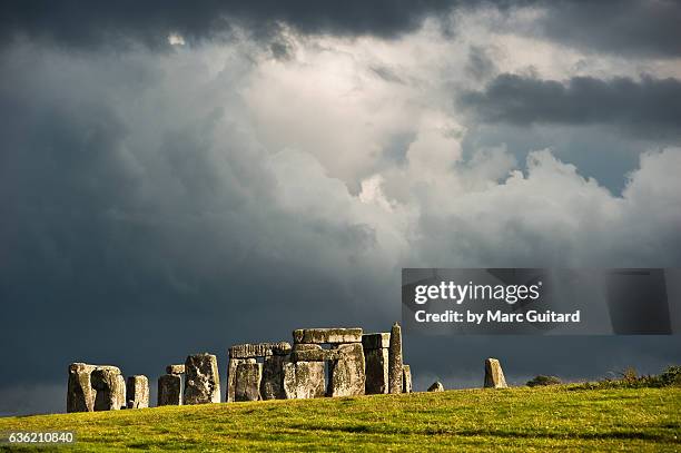 stonehenge after a storm, england. - amesbury stock pictures, royalty-free photos & images