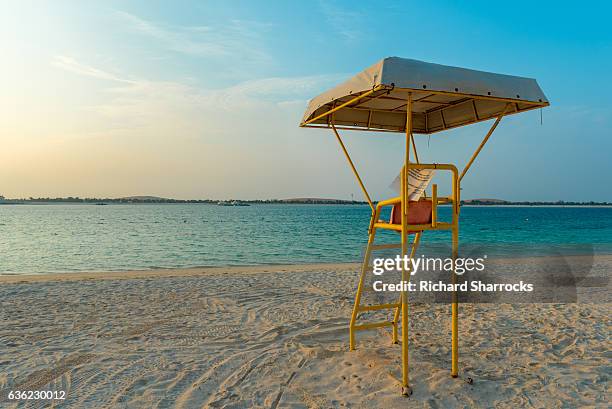 beach life guard station - abu dhabi beach stock-fotos und bilder