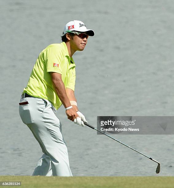 United States - Japanese golfer Hideki Matsuyama makes a left-handed shot on the No. 18 hole during his practice round for the WGC Cadillac...