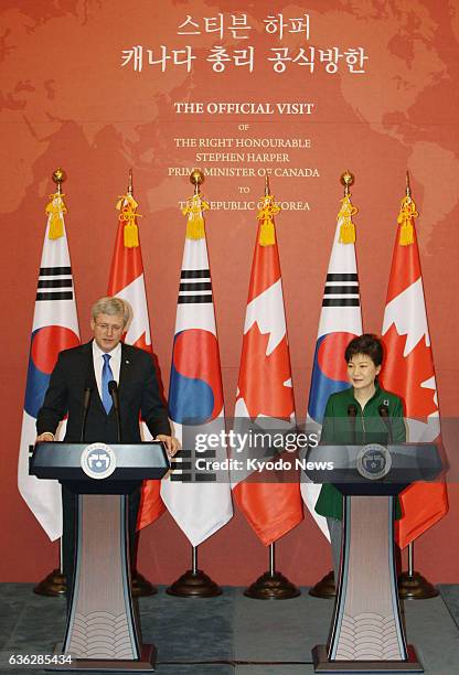 South Korea - Canadian Prime Minister Stephen Harper and South Korean President Park Geun Hye hold a joint press conference after their talks in...
