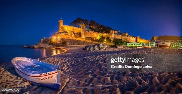 blue hour at the beach in tossa de mar, girona, catalonia, spain - tossa de mar imagens e fotografias de stock
