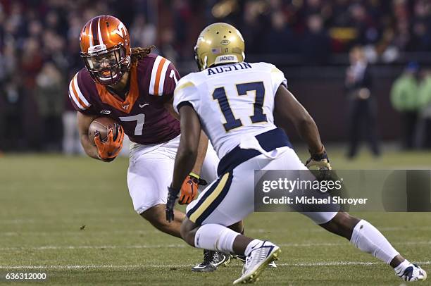 Tight end Bucky Hodges of the Virginia Tech Hokies carries the ball following his reception against the Georgia Tech Yellow Jackets in the second...