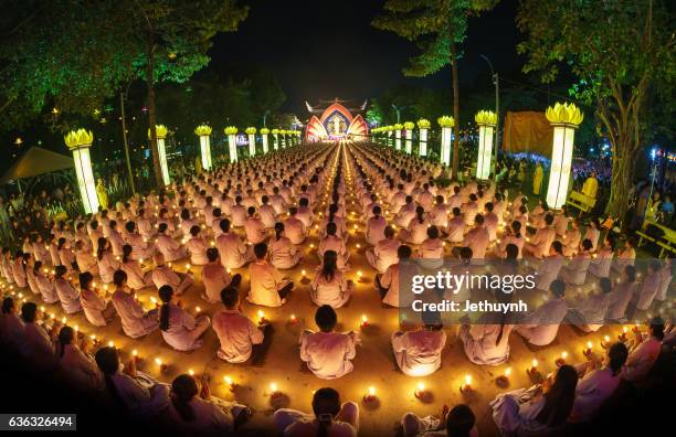 participants in a parade celebrate buddhas festival day vietnam - buddha stock pictures, royalty-free photos & images