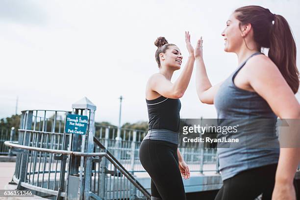 Athletic Women High Five After Run