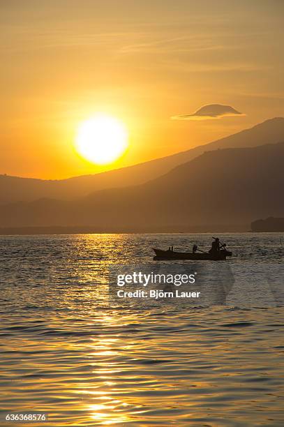 fisherman in the morning light - lauer stock pictures, royalty-free photos & images