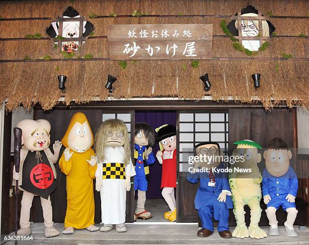 Japan - "Yokai" monsters featured in the popular comic series "Gegege no Kitaro" pose in front of a new attraction, "Yokai oyasumidokoro -...