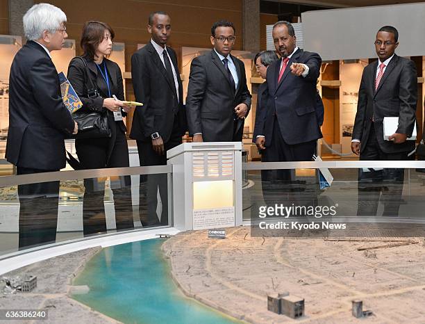 Japan - Somali President Hassan Sheikh Mohamud tours the Hiroshima Peace Memorial Museum at the Hiroshima Peace Memorial Park in Hiroshima on March...