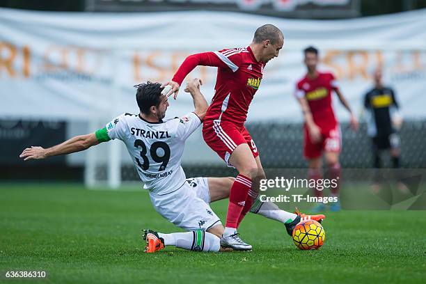 Martin Stranzl of Moenchengladbach and Aatif Chahechouhe of Sivasspor battle for the ball during the Friendly Match between Borussia Moenchengladbach...