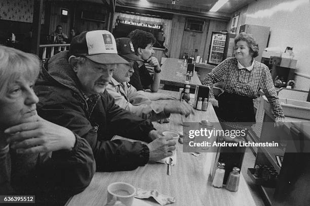 Corrections officers and prison workers eat at one of the only local dinners in Dannemora, New York, February 1, 1996. The small upstate New York...