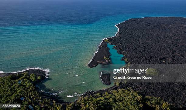 Blue lagoon is viewed on December 16 in this aerial photo taken along the Kona Kohala Coast, Hawaii. Hawaii, the largest of all the Hawaiian Islands...