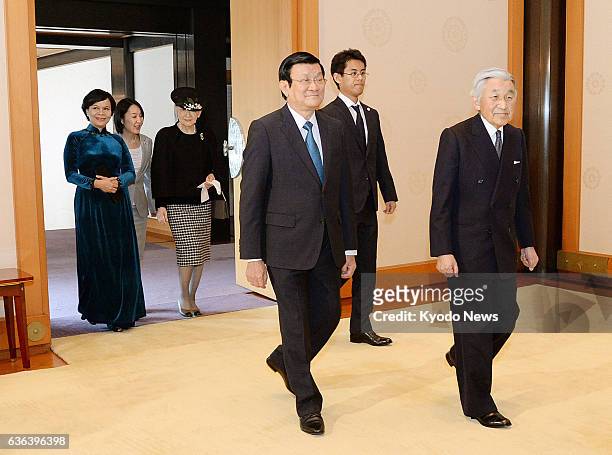 Japan - Vietnamese President Truong Tan Sang and his wife Mai Thi Hanh head to a meeting with Japanese Emperor Akihito and Empress Michiko at the...