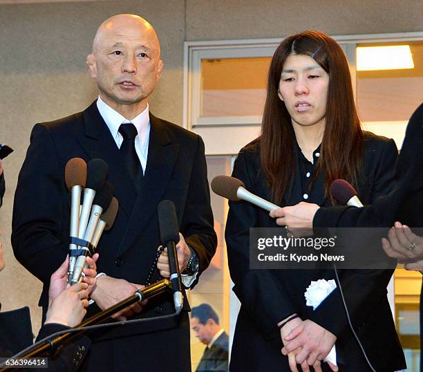 Japan - Three-time Olympic wresting gold medalist Saori Yoshida and Kazuhito Sakae, head coach of the Japanese women's national wrestling team, speak...