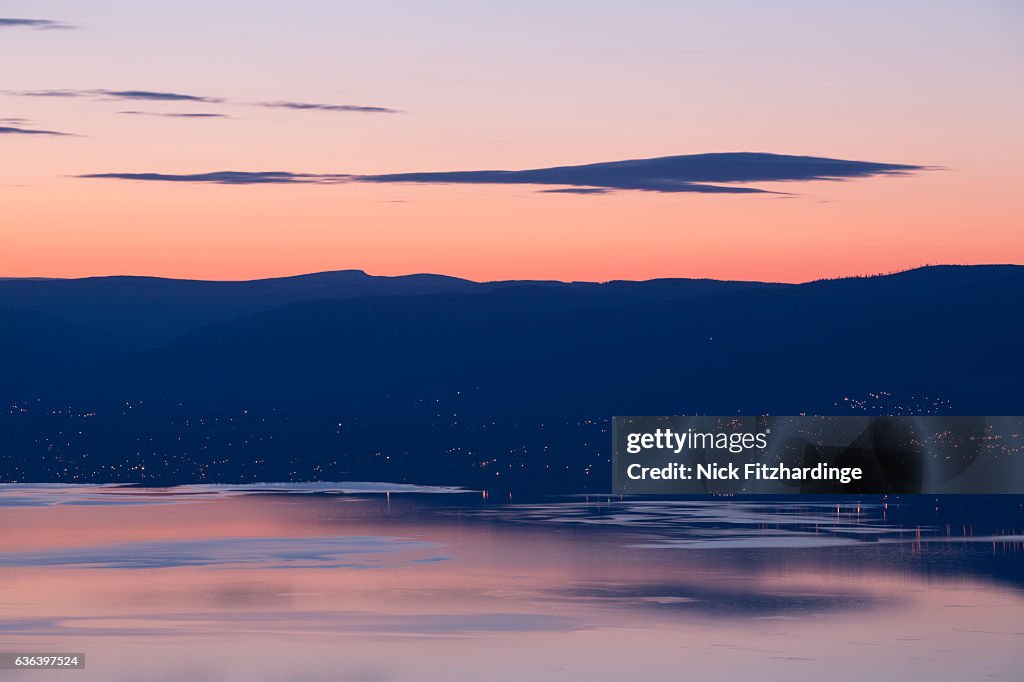 Dawn over Kelowna and Okanagan Lake from Pincushion Mountain, Peachland, British Columbia, Canada