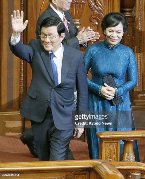 Japan - Vietnamese President Truong Tan Sang and his wife Mai Thi Hanh acknowledge applause from parliamentarians ahead of his speech at the Japanese...