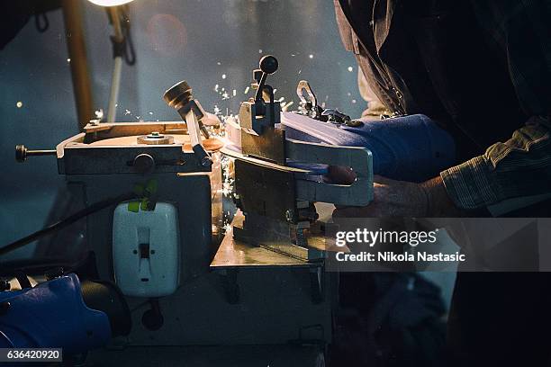 skates sharpening machine - old machinery stock pictures, royalty-free photos & images