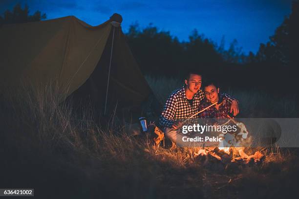 grilling delicious sausages on stick! - food state stock pictures, royalty-free photos & images