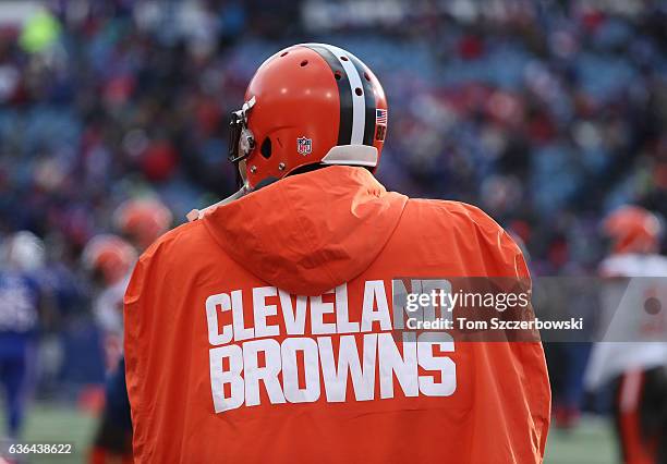 Randall Telfer of the Cleveland Browns looks on from the sideline as he wears an overcoat during NFL game action against the Buffalo Bills at New Era...