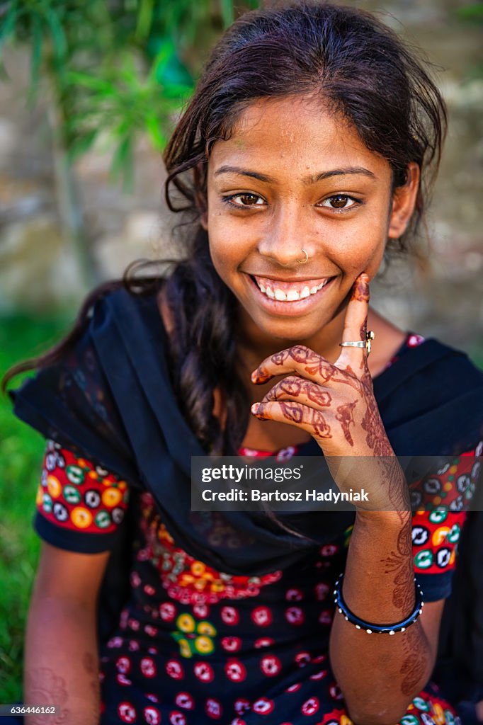 Portrait of Indian young girl with henna tattoo, Jaipur, India