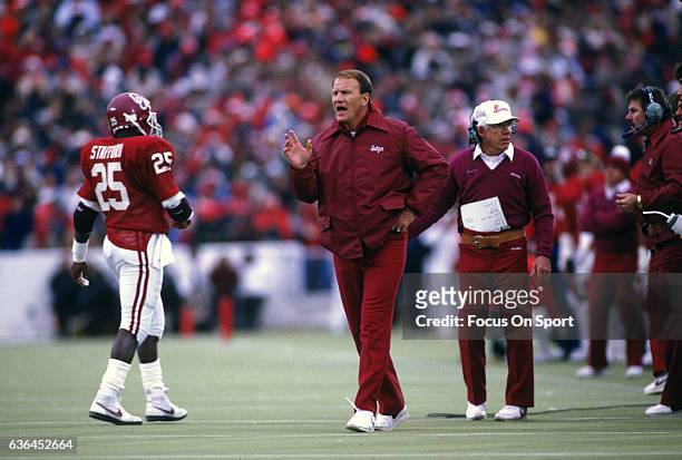 Heads coaches Barry Switzer of the University of Oklahoma walks on to the field during a NCAA football game circa 1986 at Oklahoma Memorial Stadium...