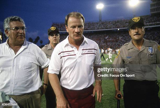 Heads coaches Barry Switzer of the University of Oklahoma walks off the field after a NCAA football game circa 1986. Switzer was the head coach of...