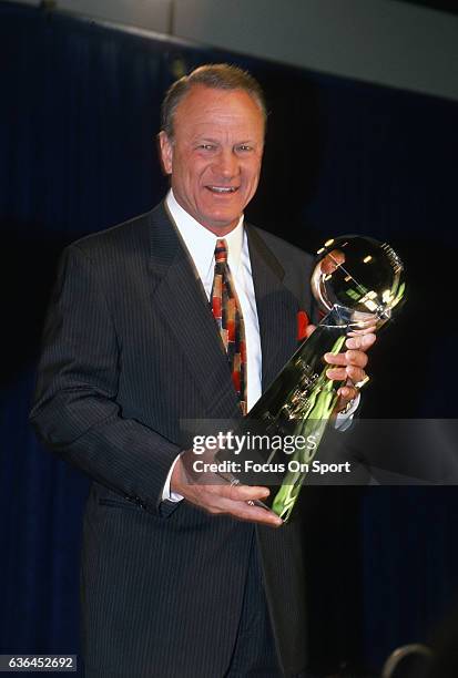 Head Coach Barry Switzer of the Dallas Cowboys holds up the Vince Lombardi Trophy prior to the Cowboy playing the Pittsburgh Steelers in Super Bowl...