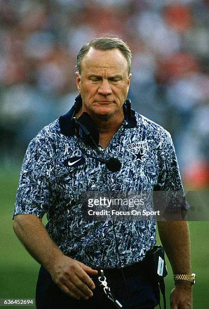 Head coach Barry Switzer of the Dallas Cowboys looks on from the sidelines during an NFL football game circa 1996. Switzer coached the Cowboys from...