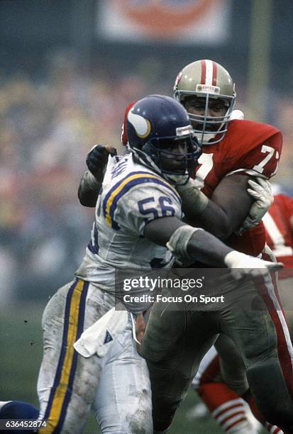 Bubba Paris of the San Francisco 49ers in action against Chris Doleman of the Minnesota Vikings during an NFL football game October 30, 1988 at...