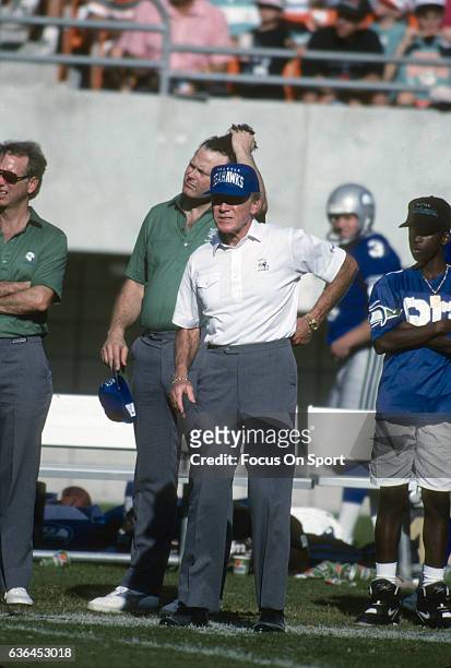 Head Coach Chuck Knox of the Seattle Seahawks looks on from the sidelines during an NFL football game circa 1990. Knox coached the Seahawks from...