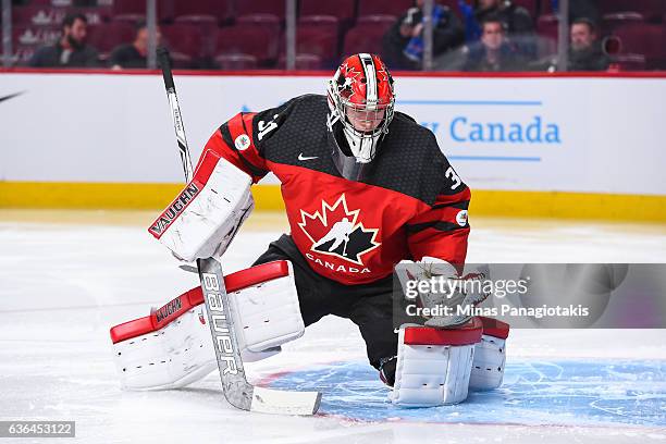 Carter Hart of Team Canada protects his net during the IIHF exhibition game against Team Finland at the Bell Centre on December 19, 2016 in Montreal,...