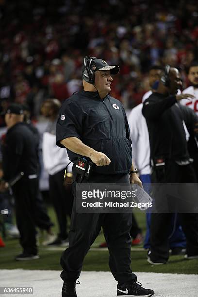 Head Coach Chip Kelly of the San Francisco 49ers stands on the sideline during the game against the Atlanta Falcons at the Georgia Dome on December...