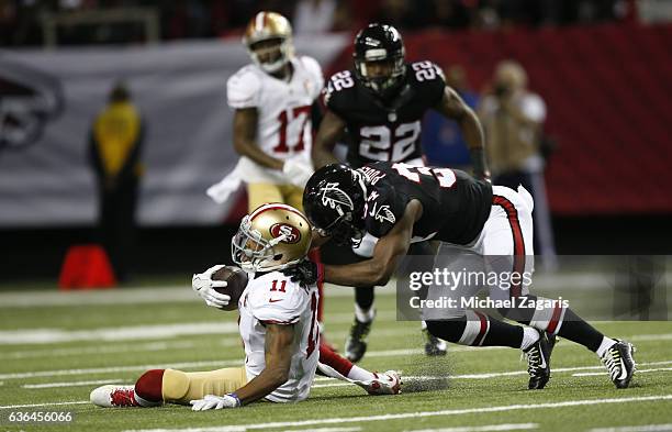 Quinton Patton of the San Francisco 49ers makes a reception during the game against the Atlanta Falcons at the Georgia Dome on December 18, 2016 in...