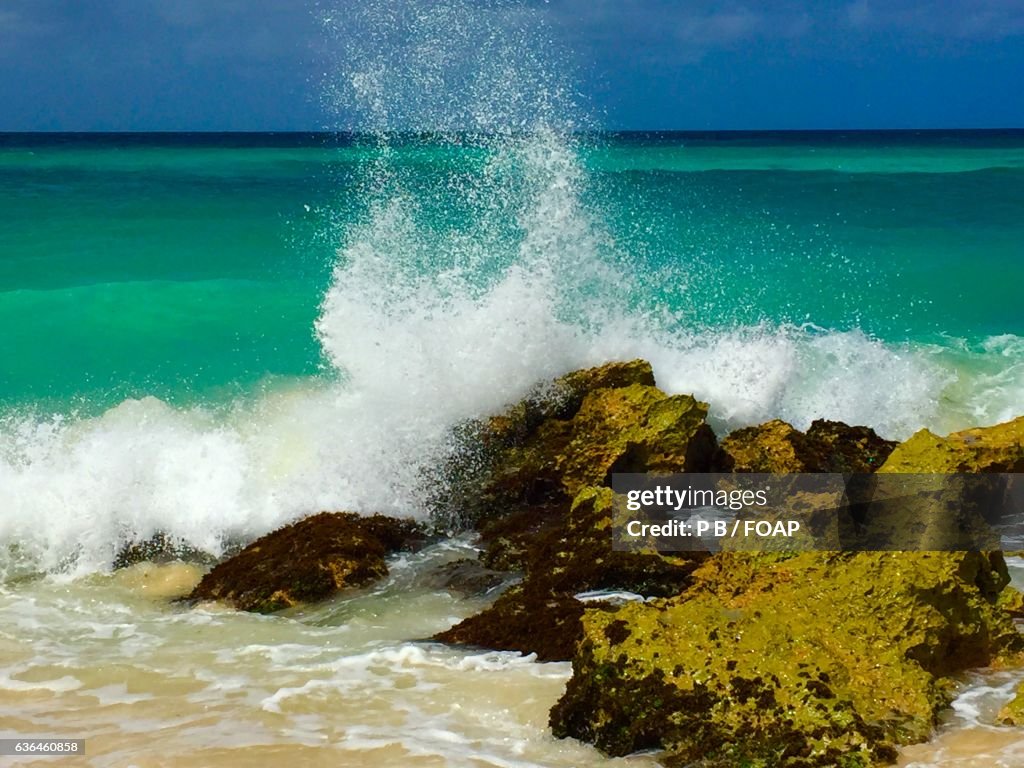 Waves crashing towards coast