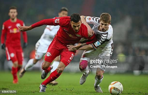 Davie Selke of RB Leipzig and Daniel Buballa of St. Pauli battle for the ball during the Second Bundesliga match between FC St. Pauli and...