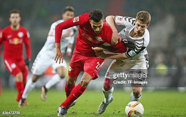 Davie Selke of RB Leipzig and Daniel Buballa of St. Pauli battle for the ball during the Second Bundesliga match between FC St. Pauli and...