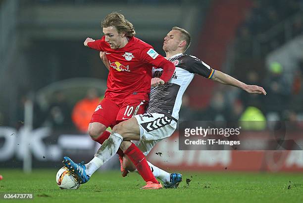 Emil Forsberg of RB Leipzig and Bernd Nehrig of St. Pauli battle for the ball during the Second Bundesliga match between FC St. Pauli and...