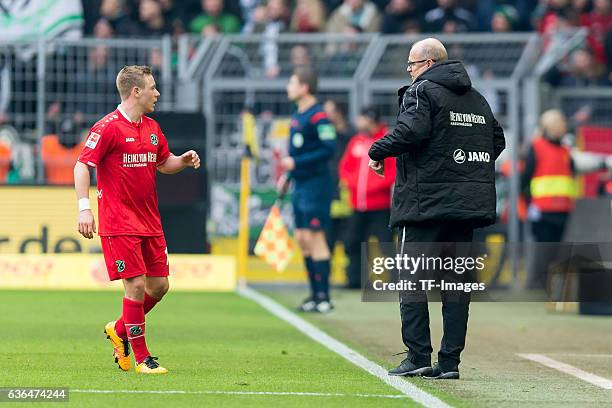 Uffe Manich Bech of Hannover 96 and Coach Thomas Schaaf of Hannover 96 looks on during the Bundesliga match between Borussia Dortmund and Hannover 96...