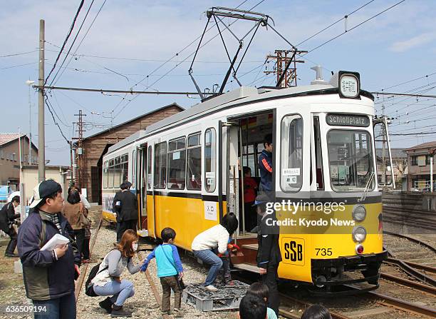 Japan - Fukui Railway Co. Unveils its German-made train car, scheduled to start service in April, in Echizen, Fukui Prefecture, on March 29, 2014.