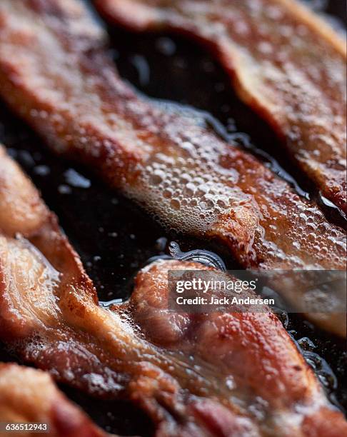 bacon strips - cooking close up stock pictures, royalty-free photos & images