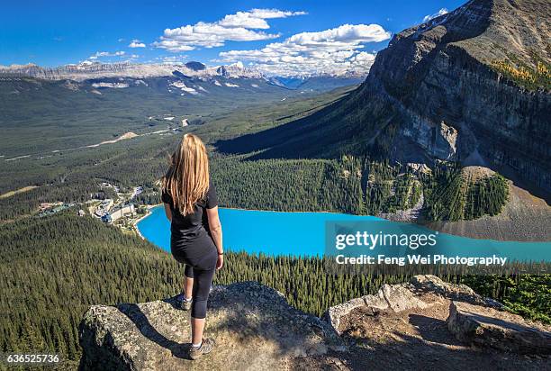 autumn hike in rocky mountains, little beehive, lake louise, banff national park, alberta, canada - lake louise ストックフォトと画像